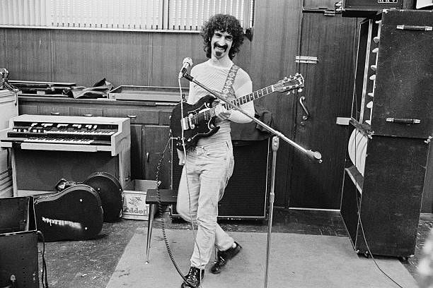 Frank Zappa, composer and guitarist for the band Mothers of Invention, in a recording studio.