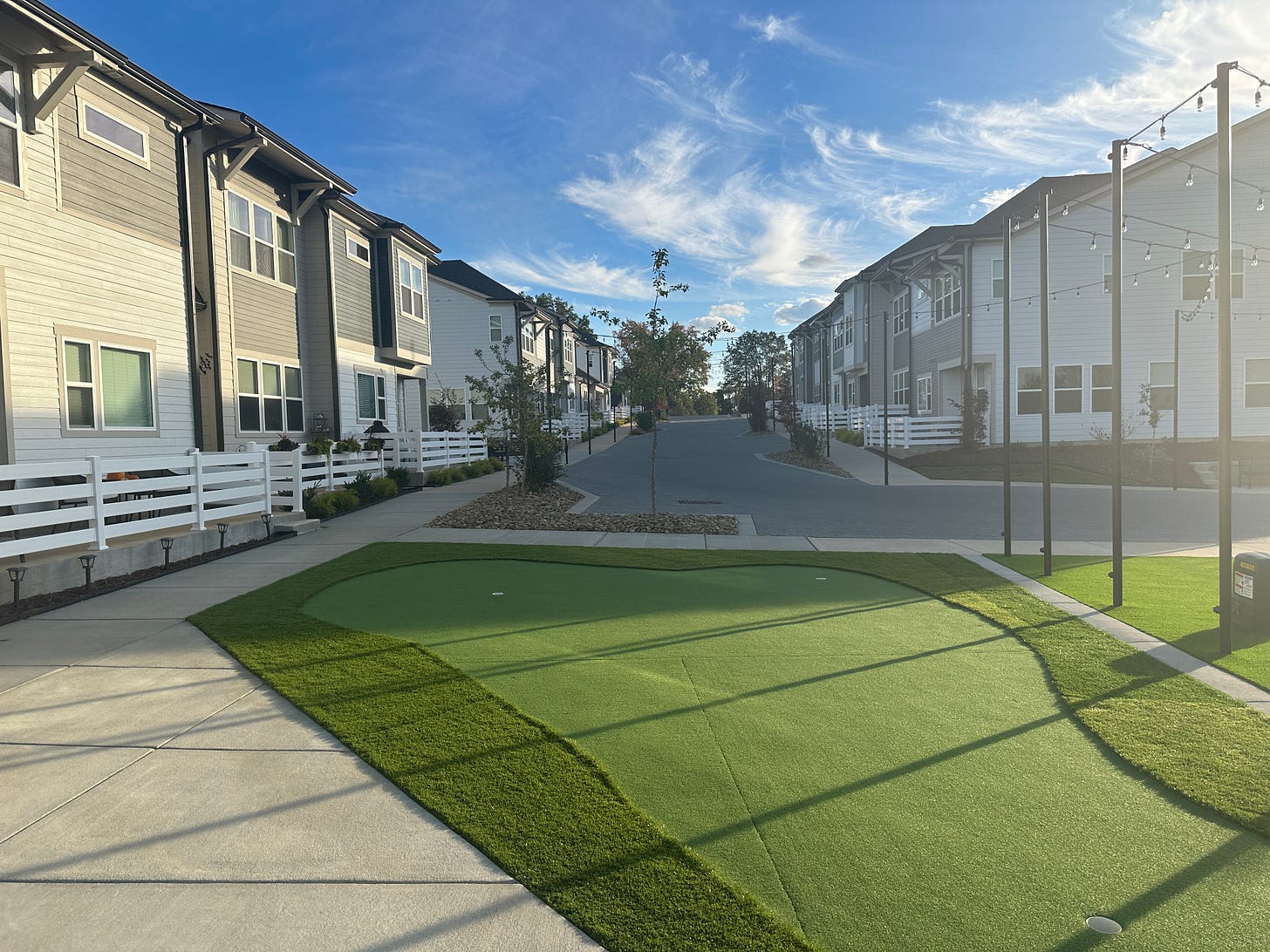 putting green near townhomes