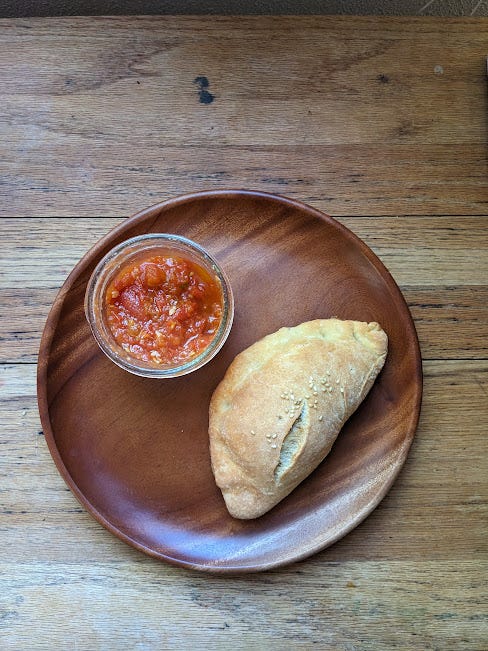 calzone and dipping sauce