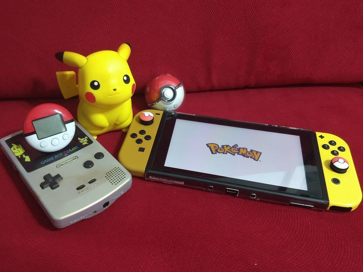 Rikki shared a photograph of some of his Pokémon belongings, including a Pokémon-themed Nintendo Switch, Pokéwalker, Poké Ball Plus, a Pikachu figure, and his original Game Boy Color console, featuring Pikachu and Pichu.