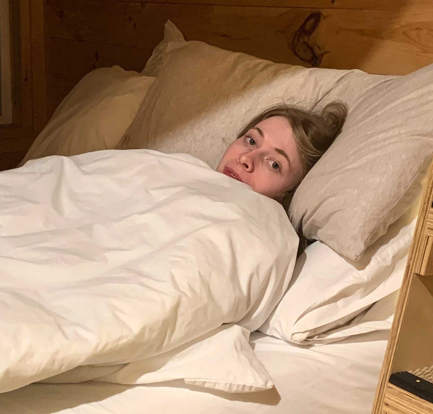 Vivien Mildenberger sleeping in a cabin on an art retreat