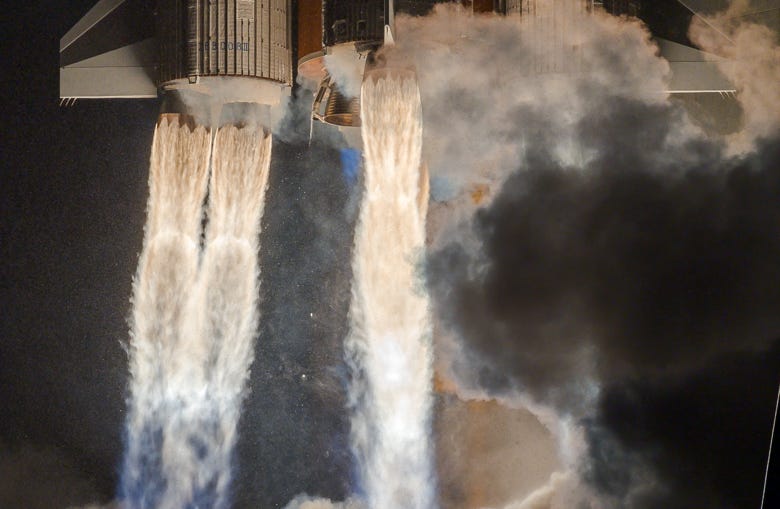 YF-100 engines burning during the launch of a Long March 5.