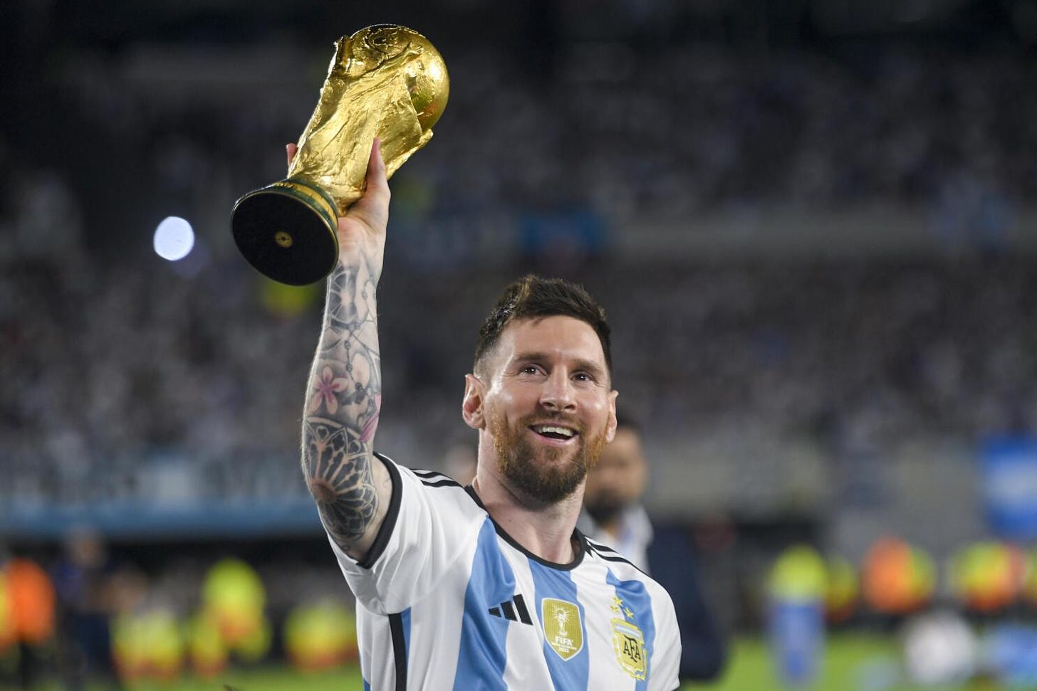 Messi mania grips Argentina in 1st match as World Cup champs | AP News