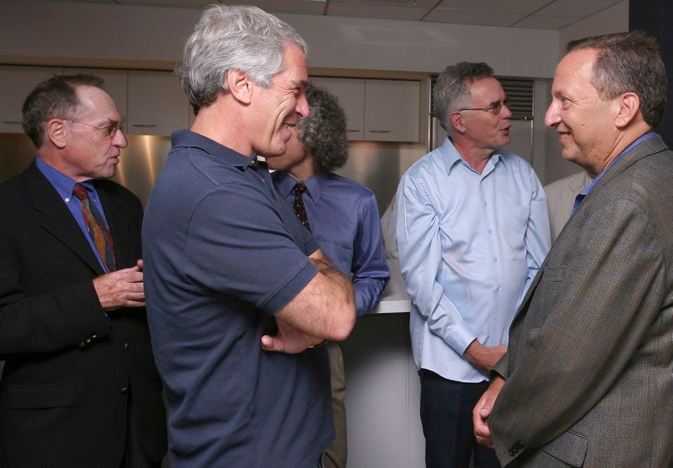 Jeffrey Epstein (second from left) hosted a dinner at Harvard in 2004. With him were (from left) Alan Dershowitz, Robert Trivers, and Lawrence Summers.