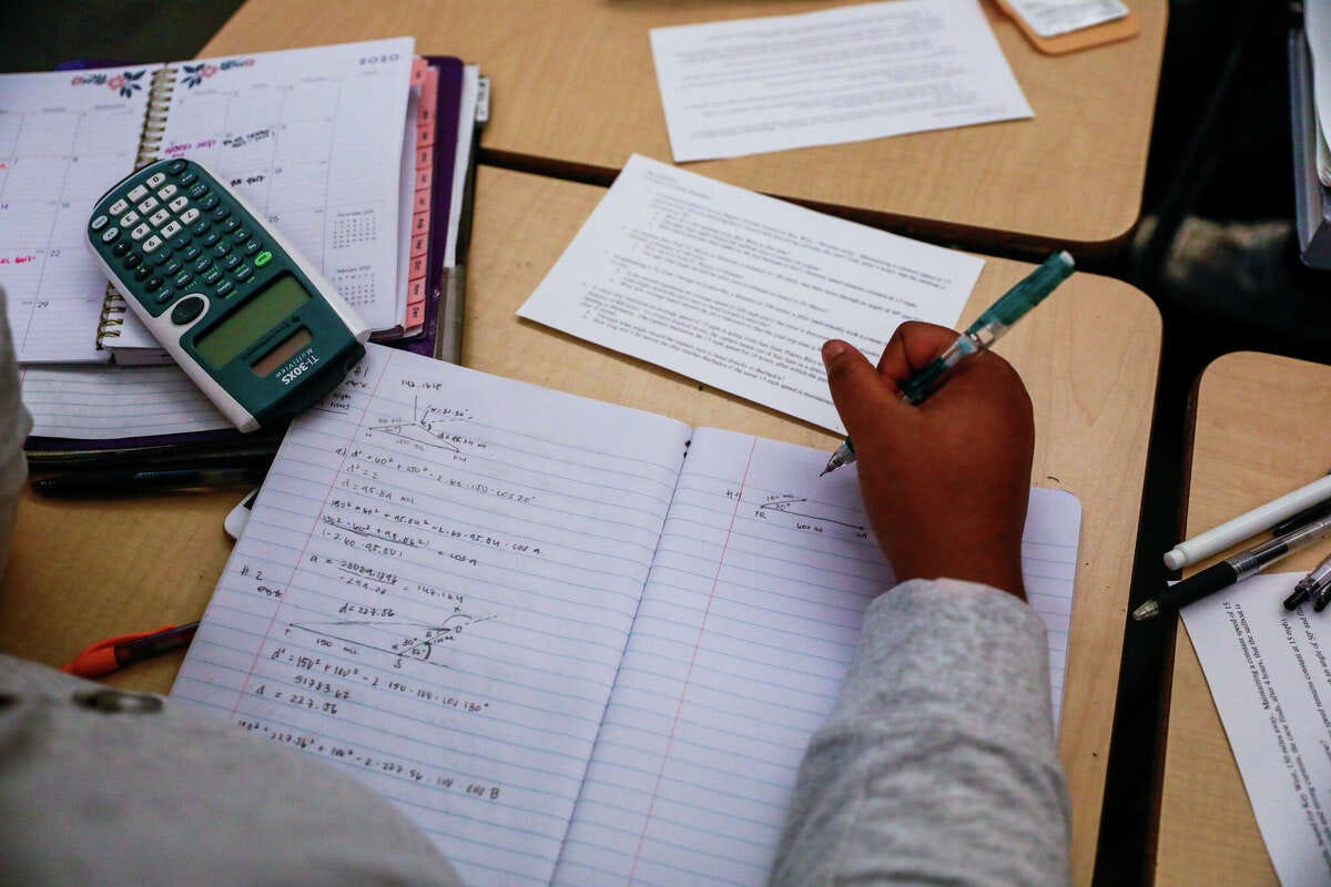 Jael Bryant takes notes during her math class at Abraham Lincoln High School in San Francisco.