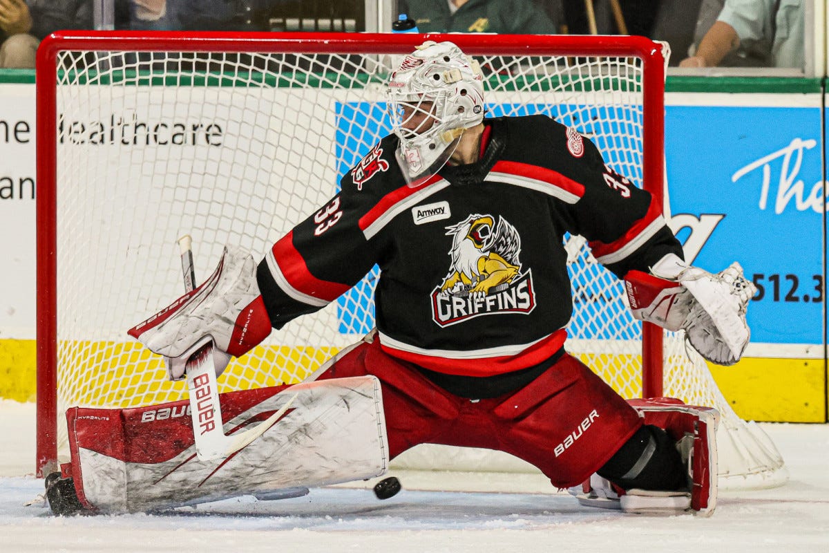 Sebastian Cossa makes a save with his right leg pad during a game with the Grand Rapids Griffins.