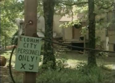 A sign warning intruders away from the enclave A sign warning intruders away from the enclave