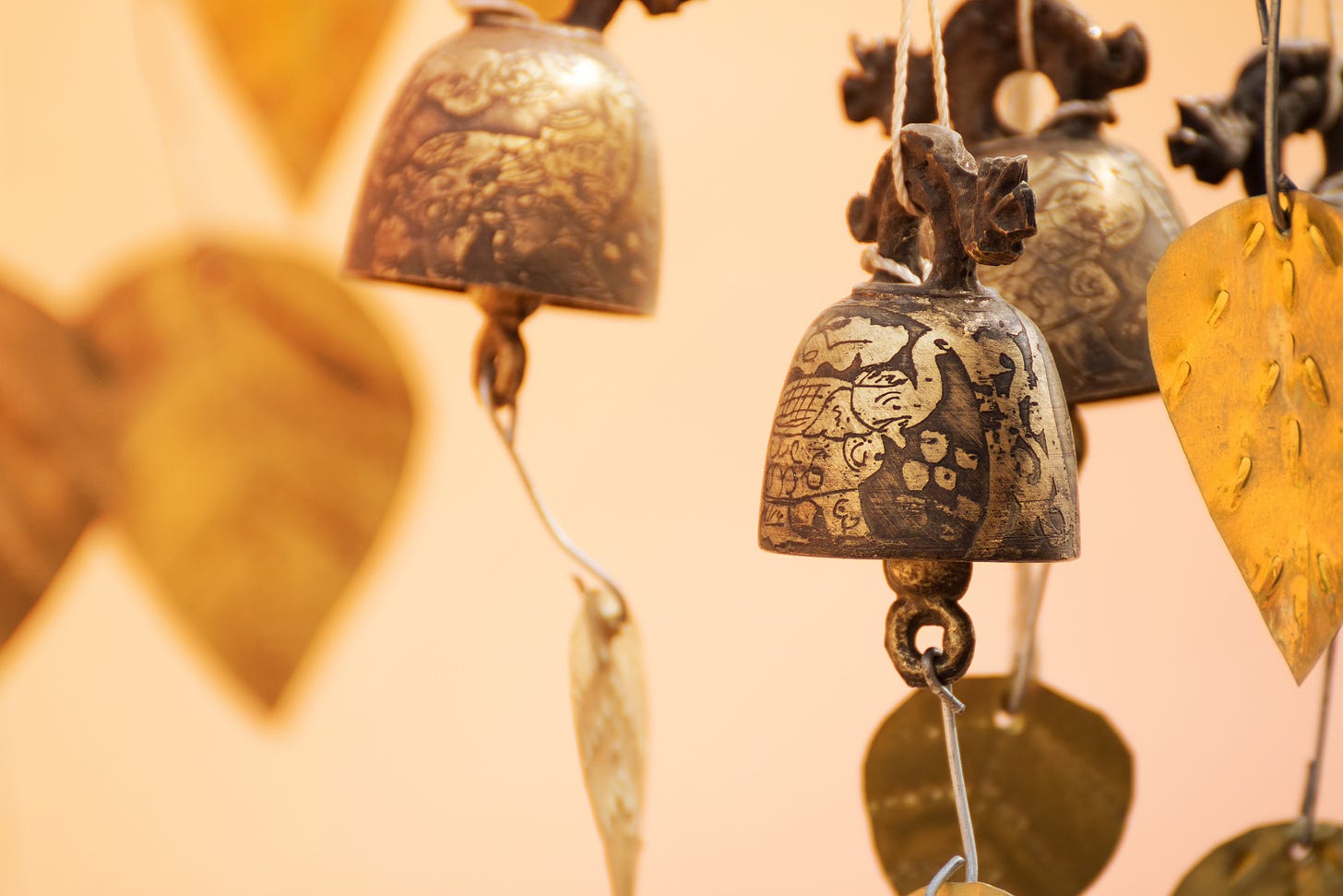 Burmese temple bells sway gently in the wind