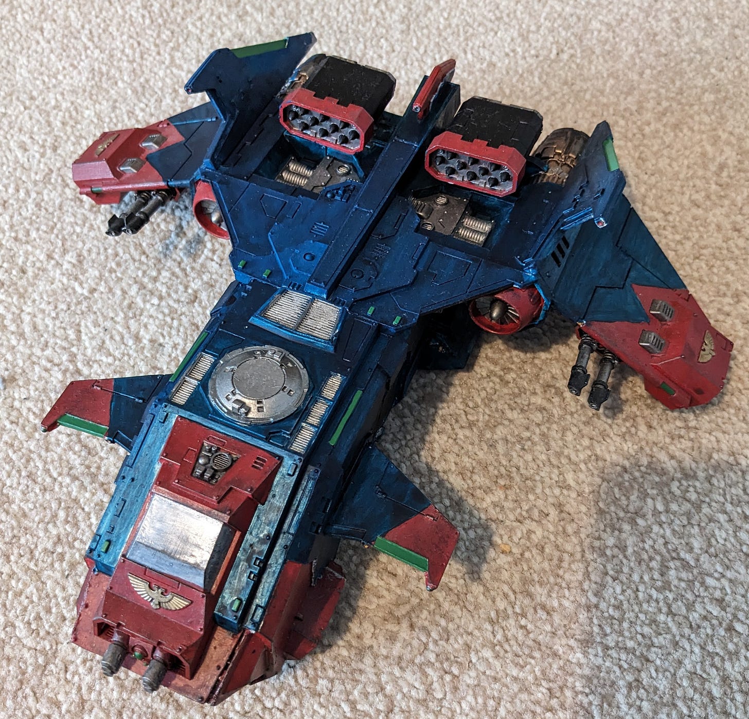 A Storm Eagle Gunship from the Horus Heresy Sci Fi setting painted in the Blue and Red of the Alpha Legion A Storm Eagle Gunship from the Horus Heresy Sci Fi setting painted in the Blue and Red of the Alpha Legion