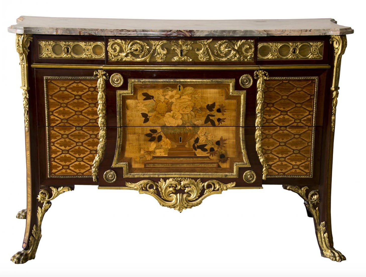 A commode designed by Jean-Henri Reisener (1734 -1806) and made for the Palace of Versailles in 1776.