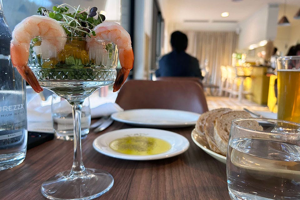 Prawn and mango cocktail on a table.