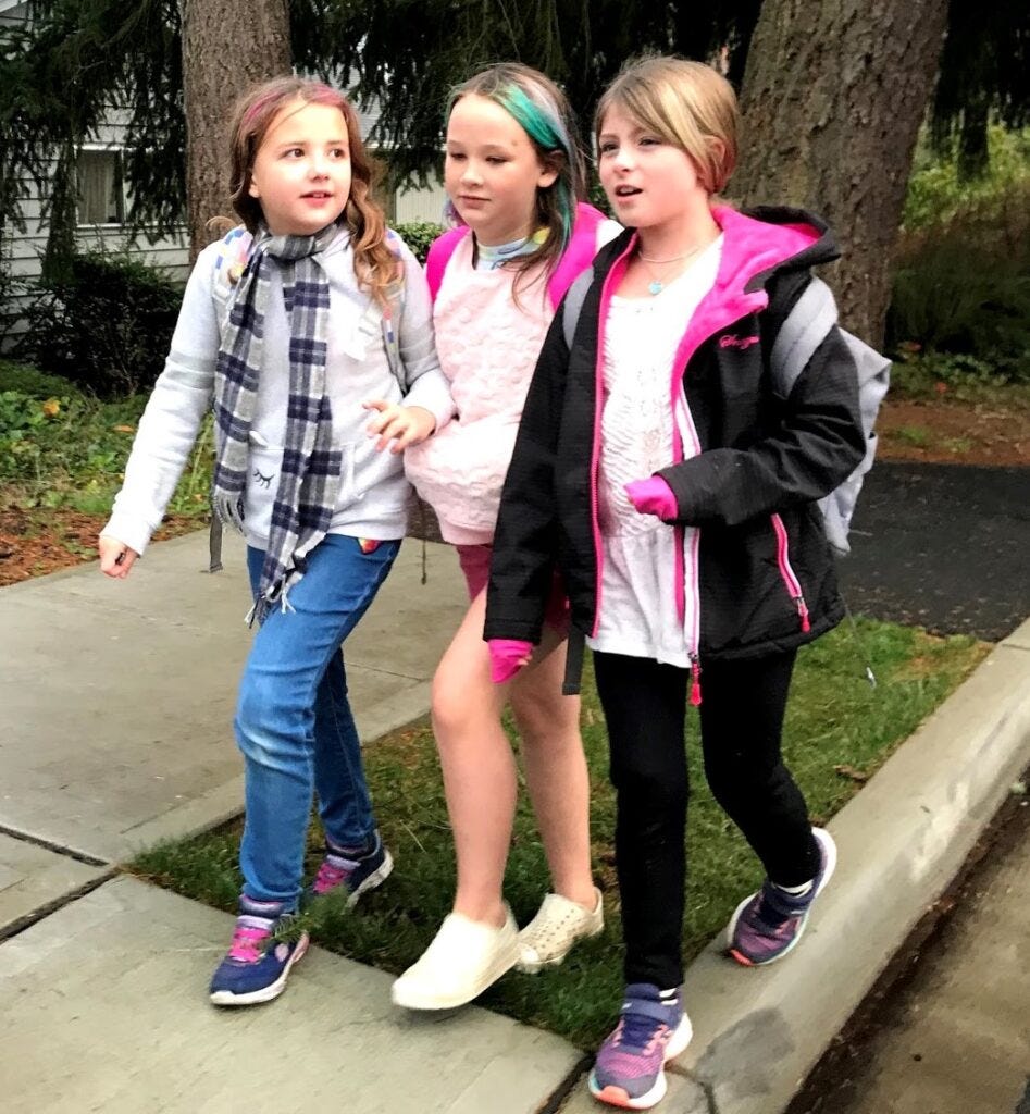 friends walking to school together