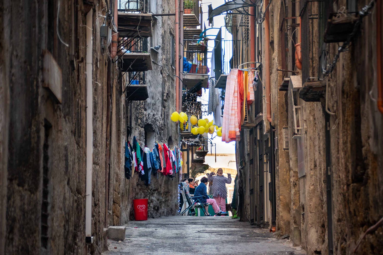 File:Street life in the narrow streets of Palermo on the island of Sicily,  Italy - 49627195741.jpg - Wikimedia Commons