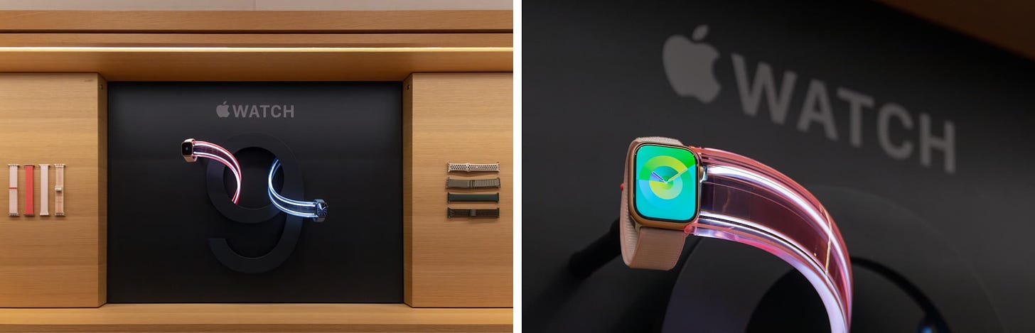 The Apple Watch Series 9 bay. A special black panel is inserted in the wood backdrop. A large "9" takes center stage.