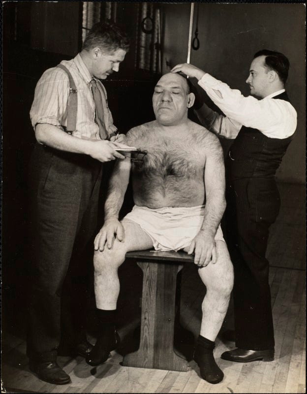 L. to r. Prof. Carleton Coon & Dr. C.C. Seltzer getting height - Digital  Commonwealth