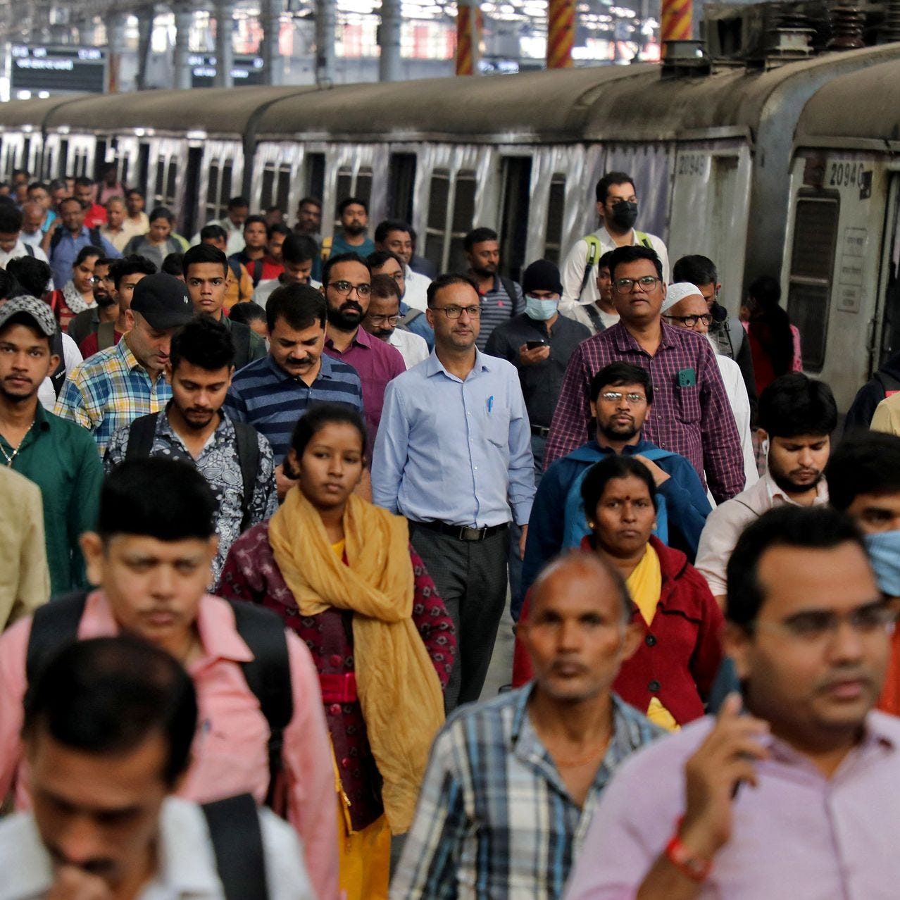 Commuters in Mumbai. India’s population is expected to reach 1.429 billion by the end of the year.