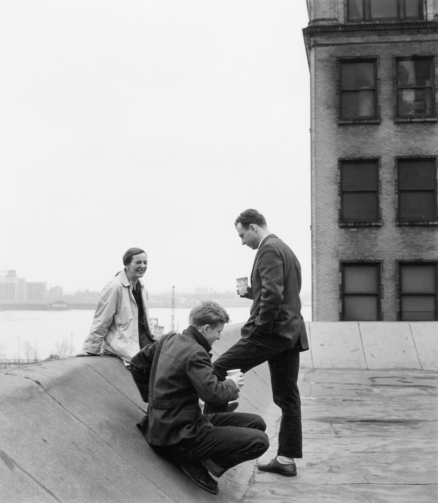 Agnes Martin Jack Youngerman and Ellsworth Kelly on the roof of 35 Coenties Slip New York 1958.