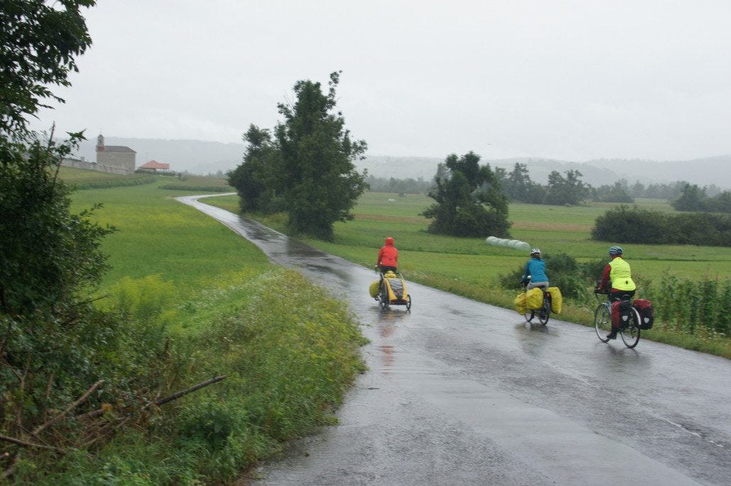 Audiobooks are great for rainy days. Here's Chelsea and our buddies from Long Haul Trekkers in a valley in Slovenia.