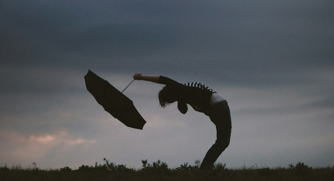 person holding umbrella