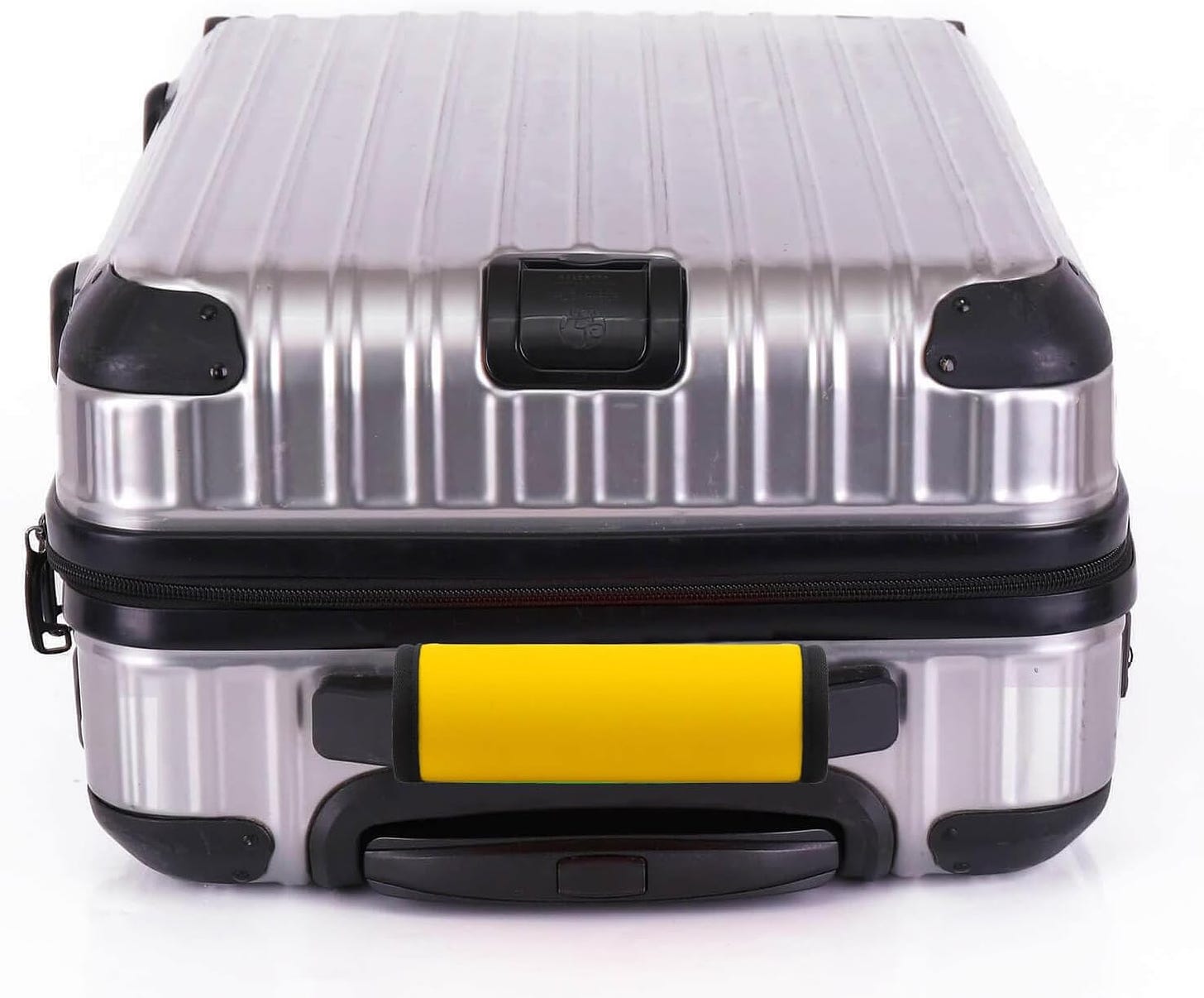 image of a silver carry-on roller suitcase with a bright yellow cover on the handle