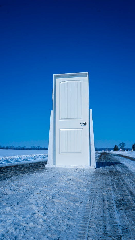 Doorway in the center of the road.