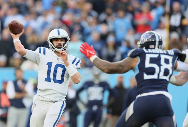 Gardner Minshew of the Indianapolis Colts throws a pass against the Tennessee Titans during overtime at Nissan Stadium on December 03, 2023 in...