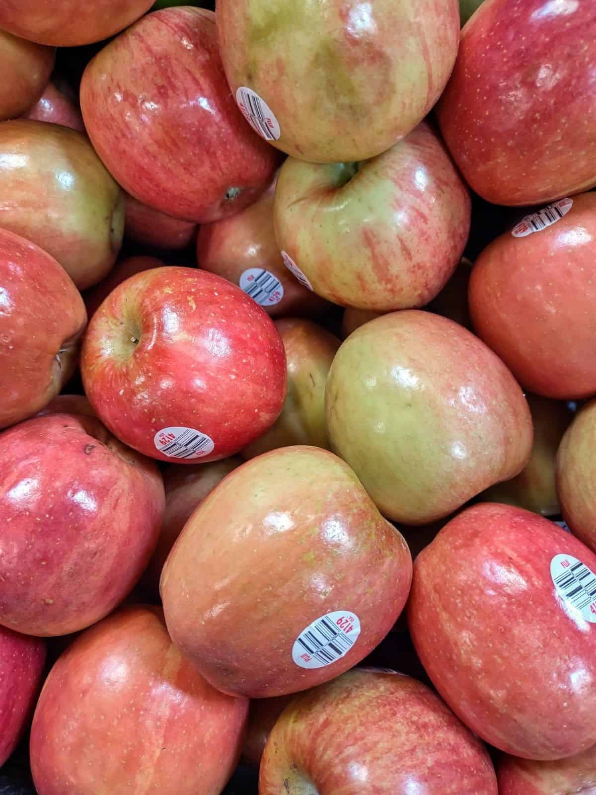 A display of Fuji apples up close.