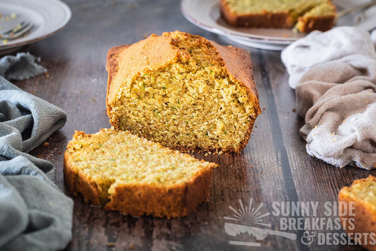 A sliced loaf of zucchini cornbread.