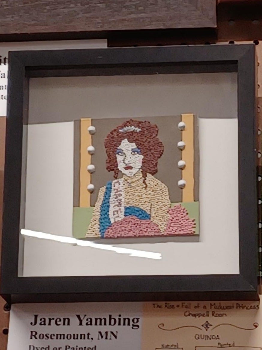 A framed picture of a person

Description automatically generated