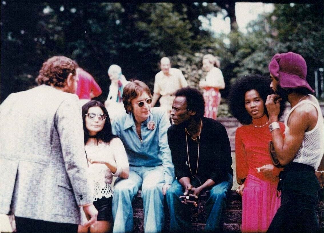 John Lennon meeting Miles Davis during a Garden Party on June 12, 1971 at Allen Klein's house. I ...