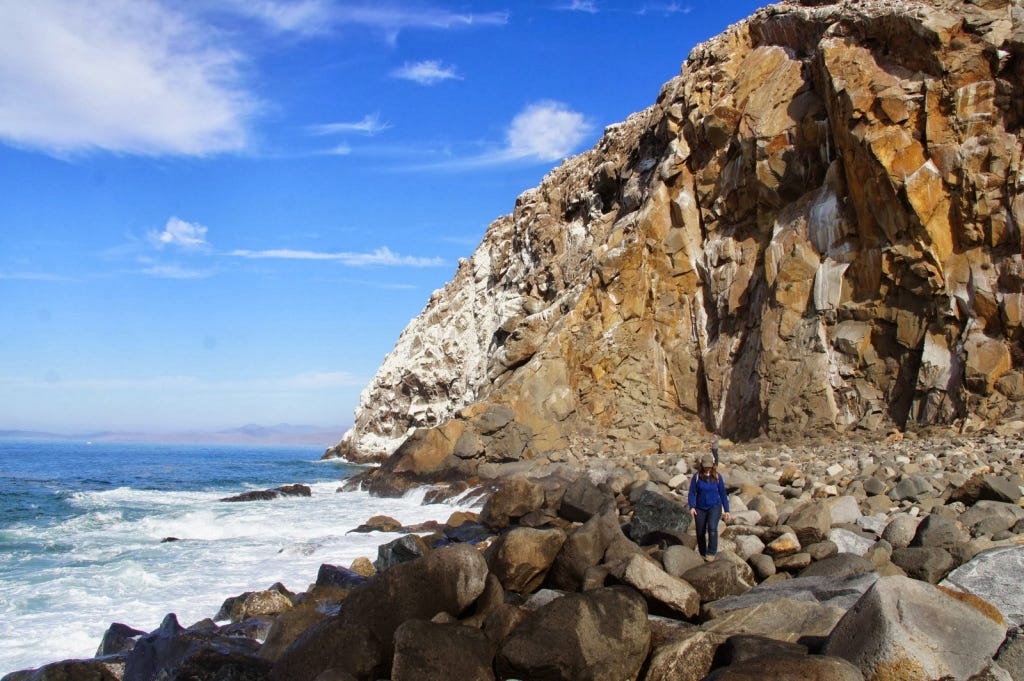 Hiking to the rock at Morro Bay.