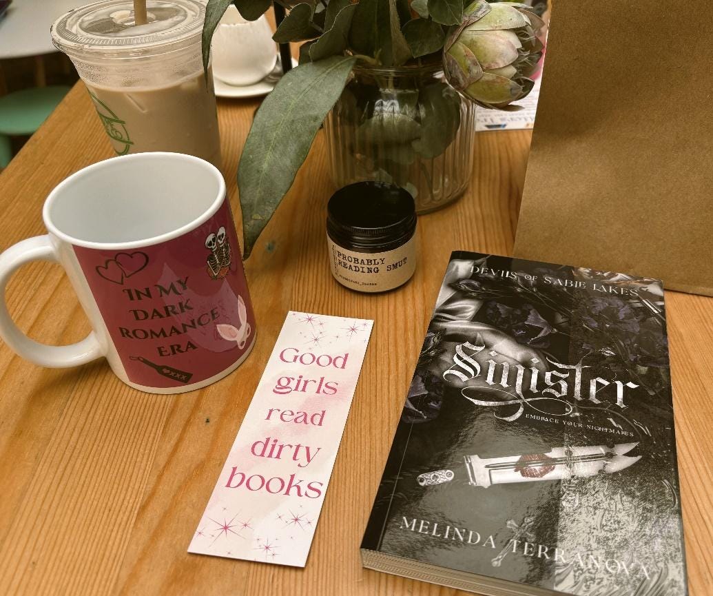 A coffee mug and books on a table

AI-generated content may be incorrect.