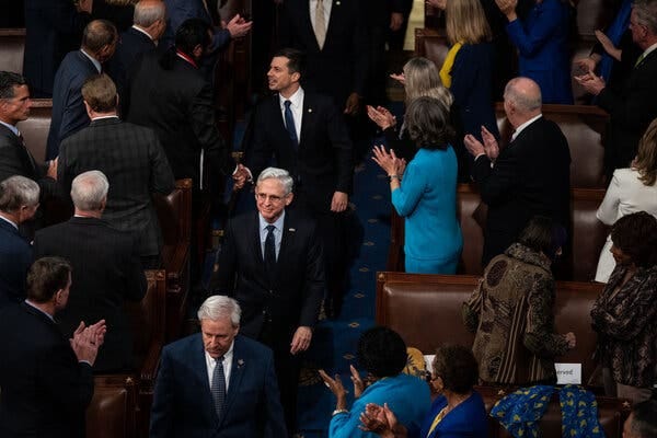 Attorney General Merrick B. Garland walking in the House chamber at the Capitol.