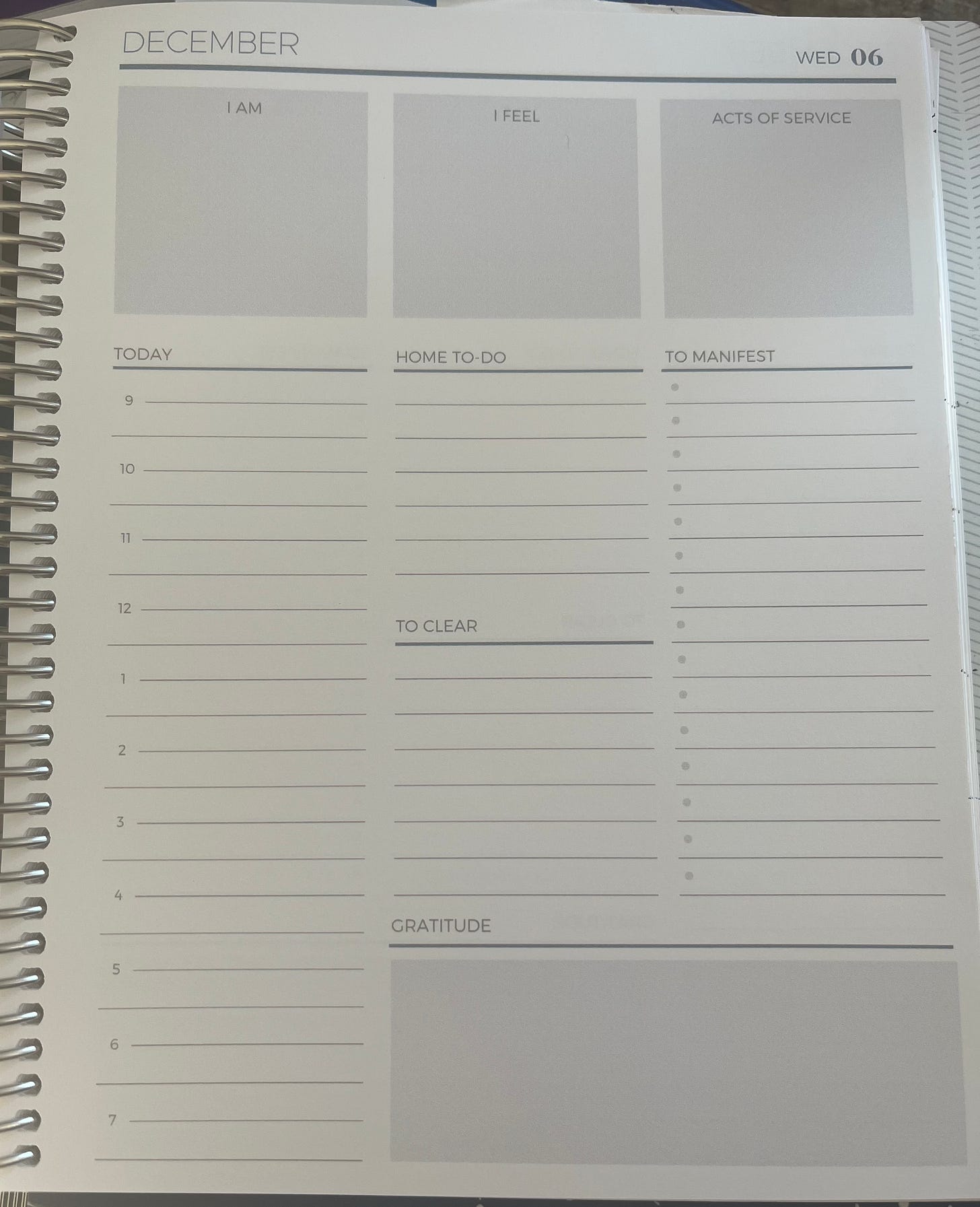 Daily paper planner view for affirmations, manifesting, moon phase, healing, gratitude, and schedule