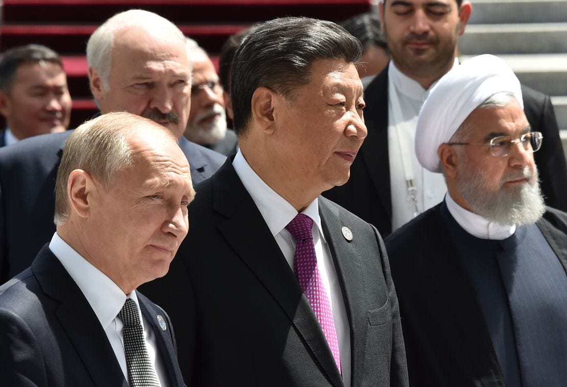 Russian President Vladimir Putin, Chinese President Xi Jinping and Iran's President Hassan Rouhani attend a meeting of the Shanghai Cooperation Organisation (SCO) Council of Heads of State in Bishkek on June 14.