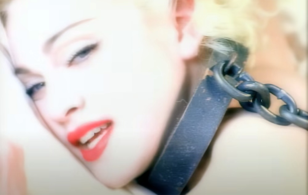 Madonna in the Express Yourself video wearing a large chain round her neck.