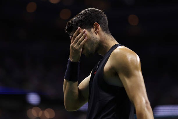 Carlos Alcaraz of Spain reacts after a point against Botic van De Zandschulp of the Netherlands during their Men's Singles Second Round match on Day...