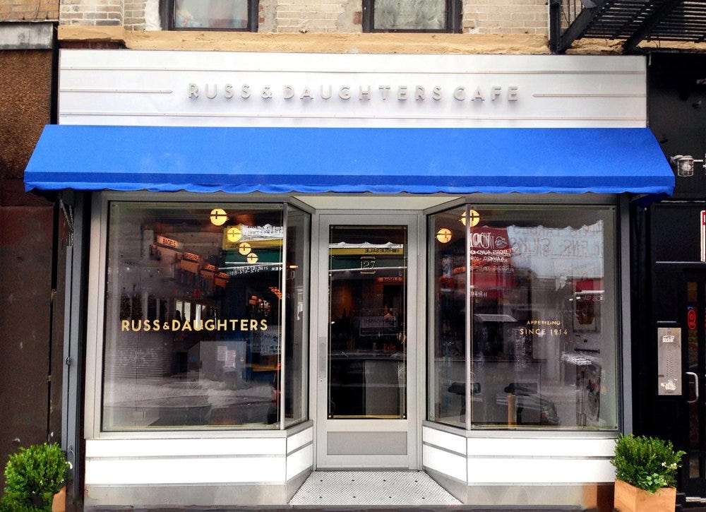 A current photo of the outside of the Russ & Daughters location at 127 Orchard St. in New York.
