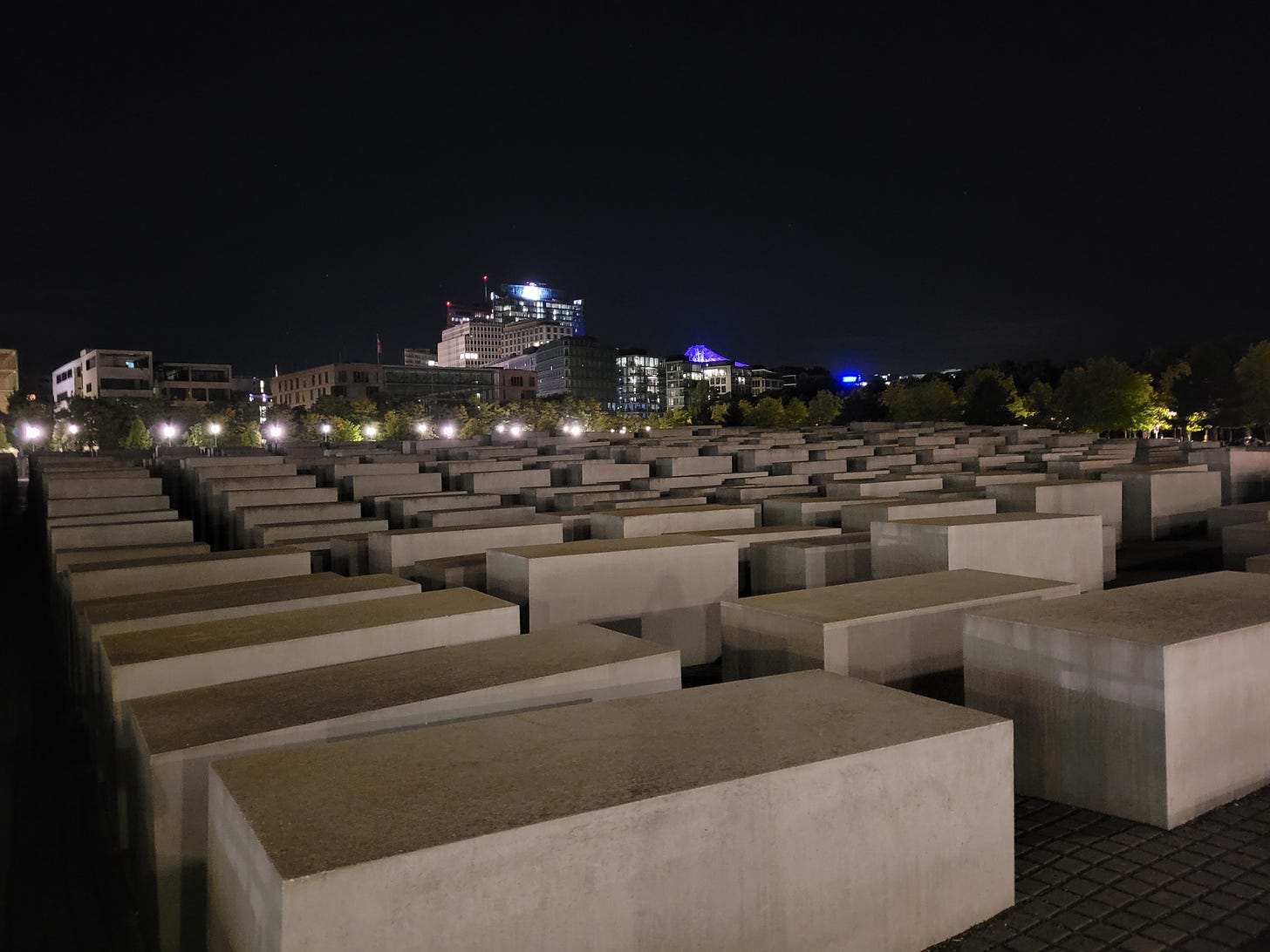 A large plaza filled with stone-blocks, with pathways in between