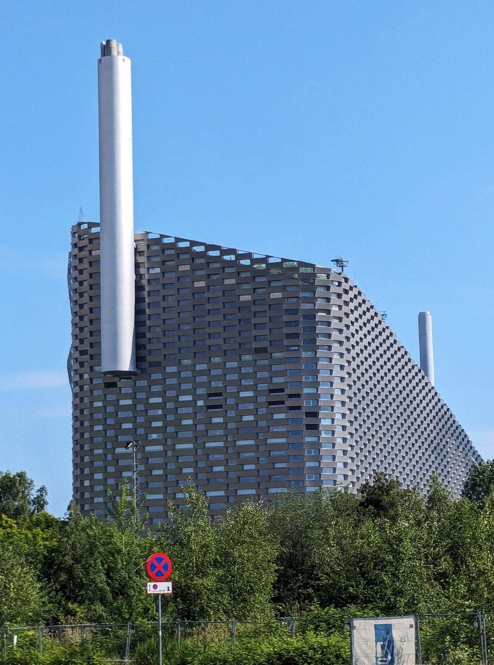 The Copenhill, Copenhill, also known as Amager Bakke, is a unique building in Copenhagen, Denmark, that combines two seemThe Copenhill, a Waste-to-Energy Plant and a Recreational Facility