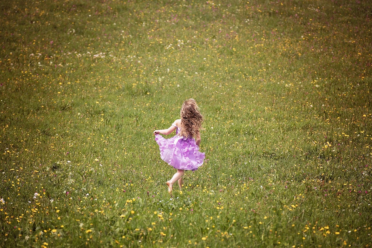 girl running in field