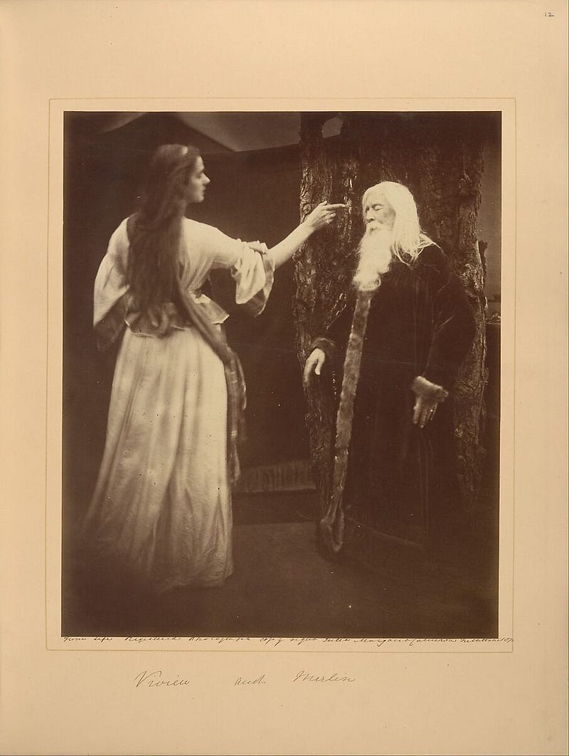 Vivien and Merlin, 1874. Ancient wizard Merlin shares his most powerful spell with young sorceress Vivien — which with one twist of a pointy finger she turns against him. Here we catch them at this moment, Merlin cringes back in alarm at what he has done. Gulp!