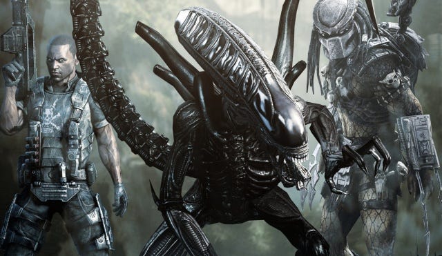 Alien vs. Predator - a futuristic marine stands on the left, an alien 'xenomorph' stands in the middle, and the Predator stands on the right. The Alien and Predator characters are recognisable from the films of the same names.