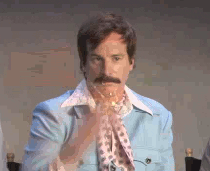Man throwing glitter in the air gif