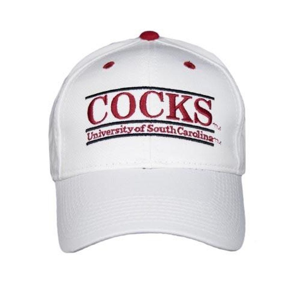 White University of South Carolina baseball hat with the word "COCKS" written on it.