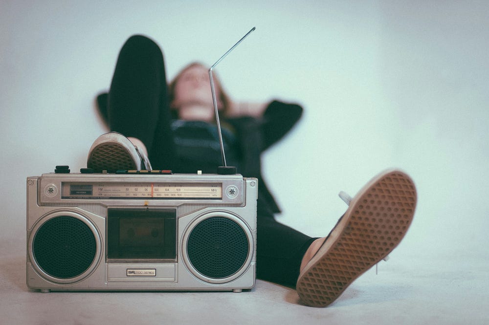 Man listening to radio.