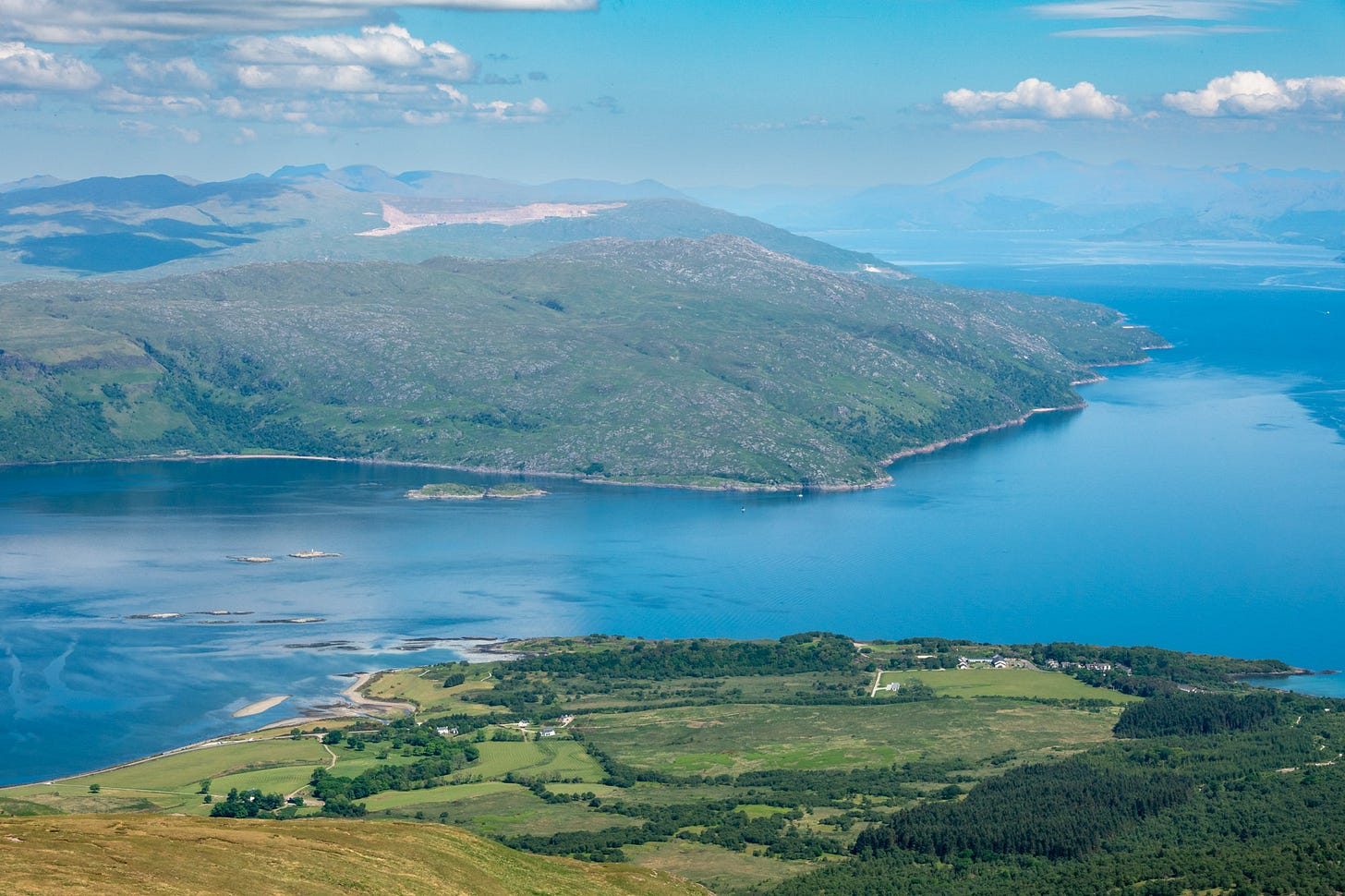 Looking down on the Sound of Mull, running off to the left, where it meets Loch Linhe, stretching away on the right to Ben Nevis  © Felicity Martin