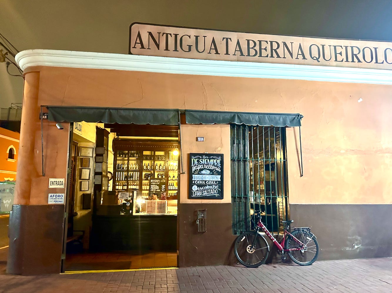 Antigua Taberna Queirolo in Pueblo Libre, Limat at night.
