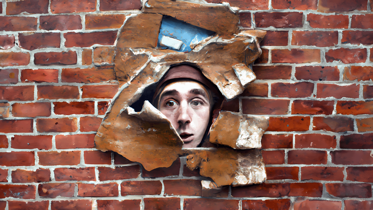 "One Less Brick in the Wall," original digital illustration by author. Young white grad student's head explodes through a brick wall.