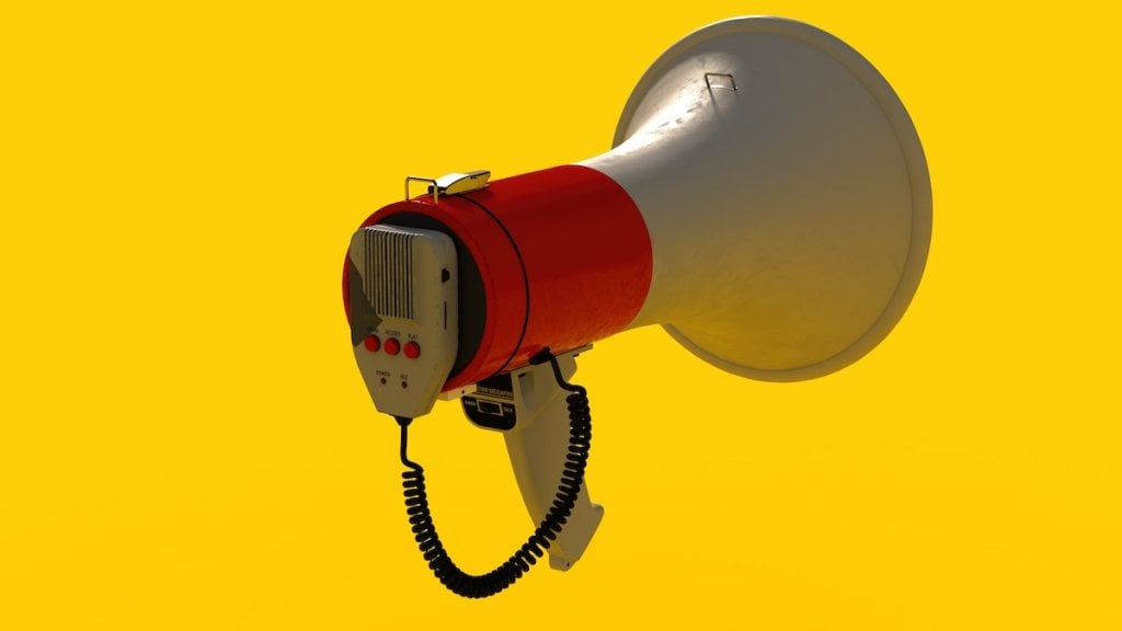 A megaphone on a yellow background